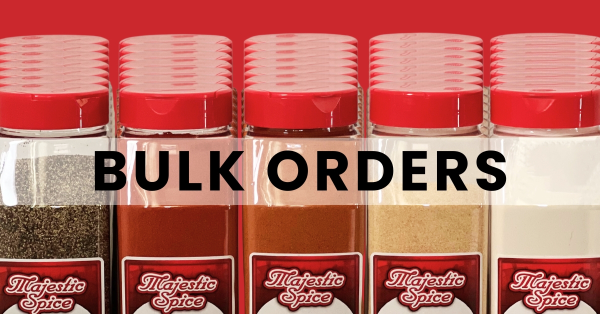 In this picture, we can see 4 different spices in a plastic transparent bottle with a red lid each with the majestic spice label. They are lined up and you can see a lot of red lids in the back. The one on the right is white, the following is yellow, the other one is red-brown, the other red and the last one on the left is like pepper. All in red background and with the legend Bulk Orders in black with a transparent line behind it.